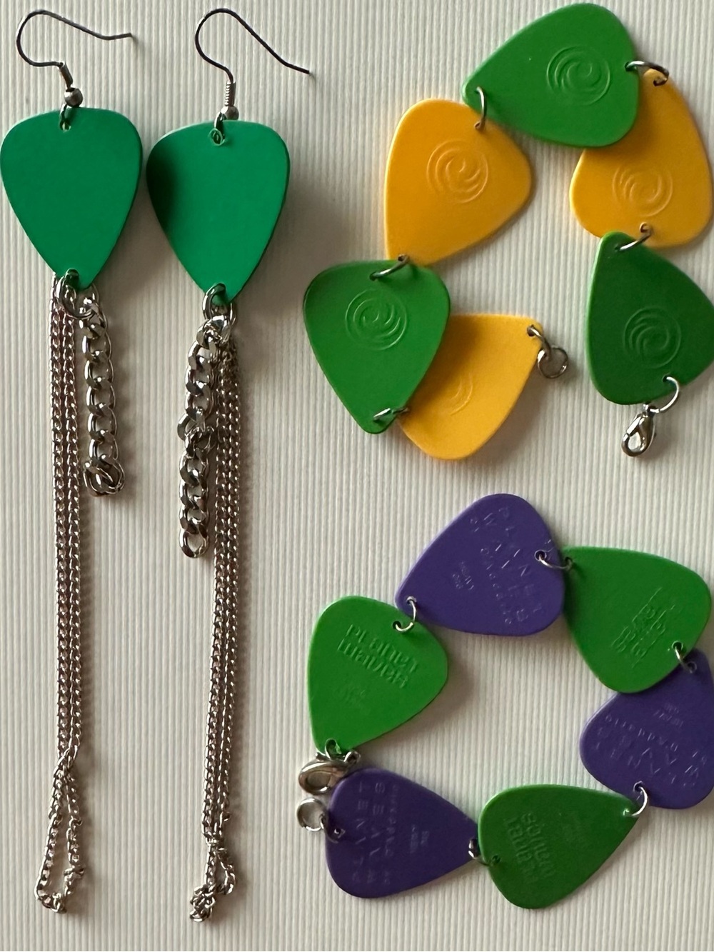 25 PAIRS OF EARRINGS, PINS, BRACELETS: GUITAR PICKS, LEGOS & VINTAGE BARBIE